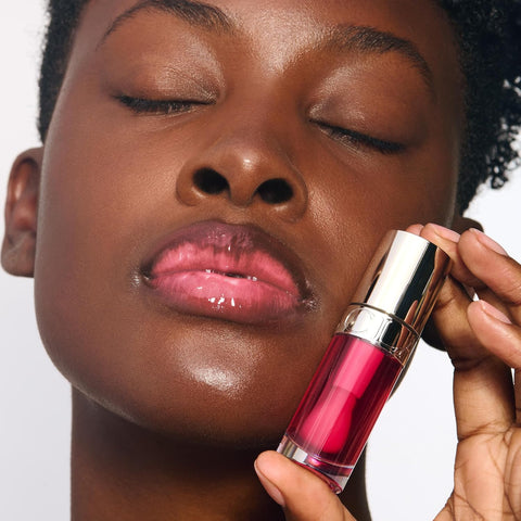 Clarins Lip Comfort Oil | Hydrating, Nourishing and Moisturizing Lip Oil | Sheer, High Shine Finish | Soothes, Comforts and Protects Lips | Visibly Plumps | 93% Natural Ingredients | 0.2 Ounces