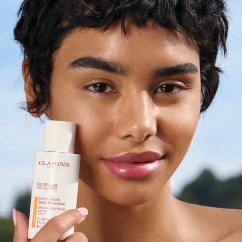 Clarins UV Plus Anti-Pollution, Broad Spectrum SPF 50 Tinted Face Sunscreen | Sheer Finish | Lightweight and Oil-Free | Triple Protection From UVA/UVB Rays, Free Radicals and Pollutants